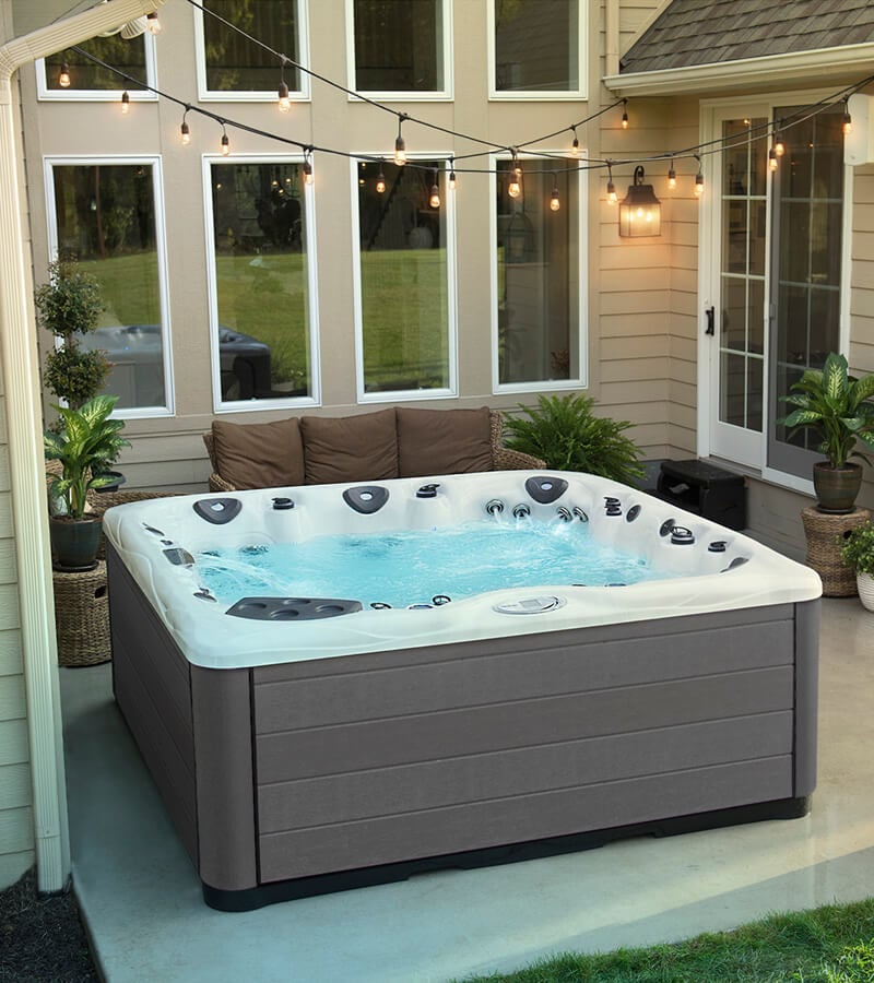 Transform a simple patio into sanctuary with a Michael Phelps Legend Series hot tub